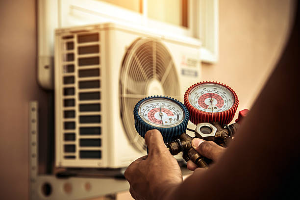 Professional Air Conditioning Service technician working in Tampa, FL